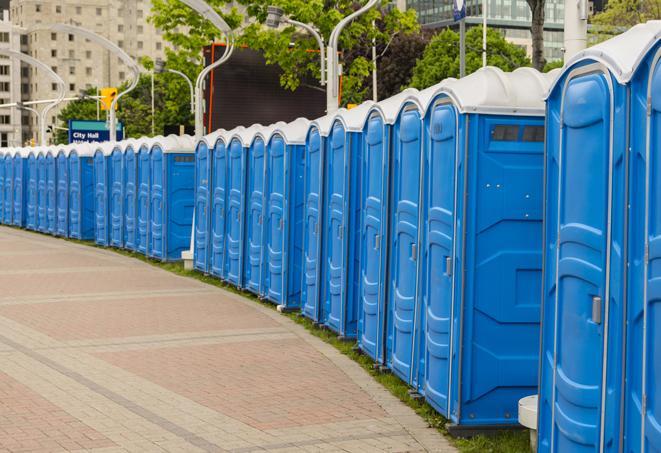 a row of portable restrooms at a fairground, offering visitors a clean and hassle-free experience in Brighton